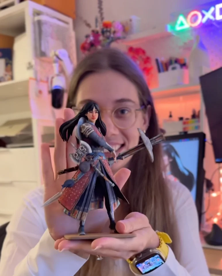 Anastasia Kukosh holding the full-colour 3D printed Dragon Warrior figurine